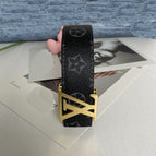 Gold buckle black flower